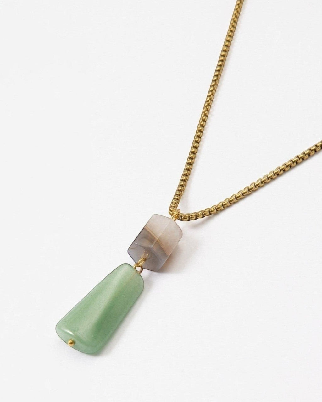 Elsita Jewelry Wildbach necklace featuring a hexagonal Uruguayan agate and trapezoid green aventurine on brass chain.