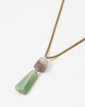 Elsita Jewelry Wildbach necklace featuring a hexagonal Uruguayan agate and trapezoid green aventurine on brass chain.