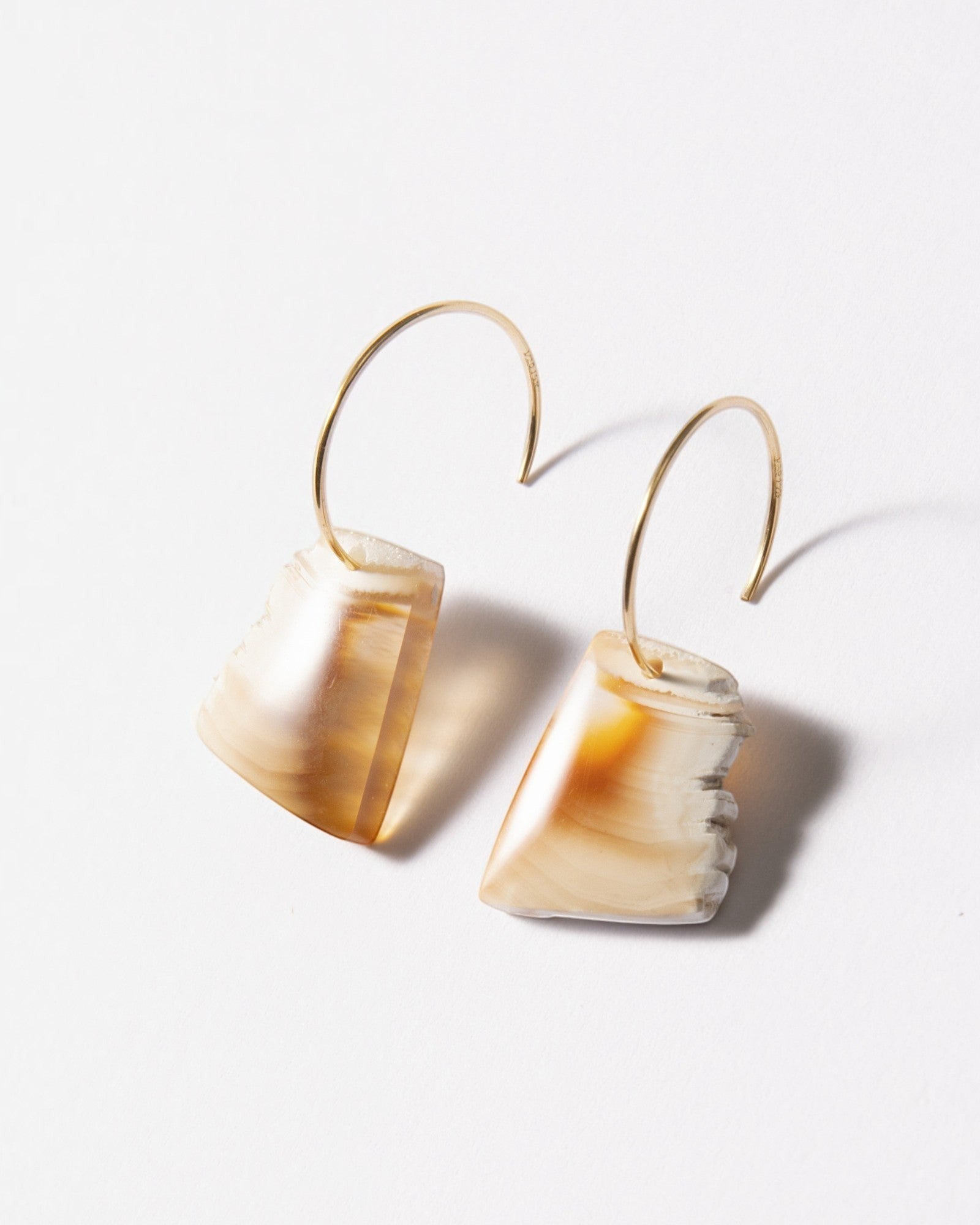 Elsita Jewelry Wild 2 earrings featuring freeform Indonesian agate slices on 14K gold-filled hoops with raw edges.