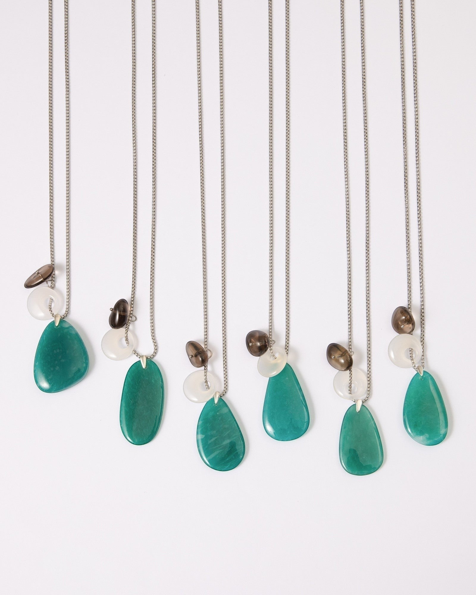 Elsita Jewelry Stein am Rhein necklaces featuring freeform Amazonite, white agate, and smoky quartz on silver chains.