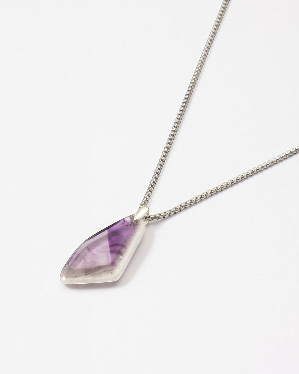 Elsita Jewelry Kaleidoscope IV amethyst pendant necklace with a sterling silver bail on a stainless steel chain.