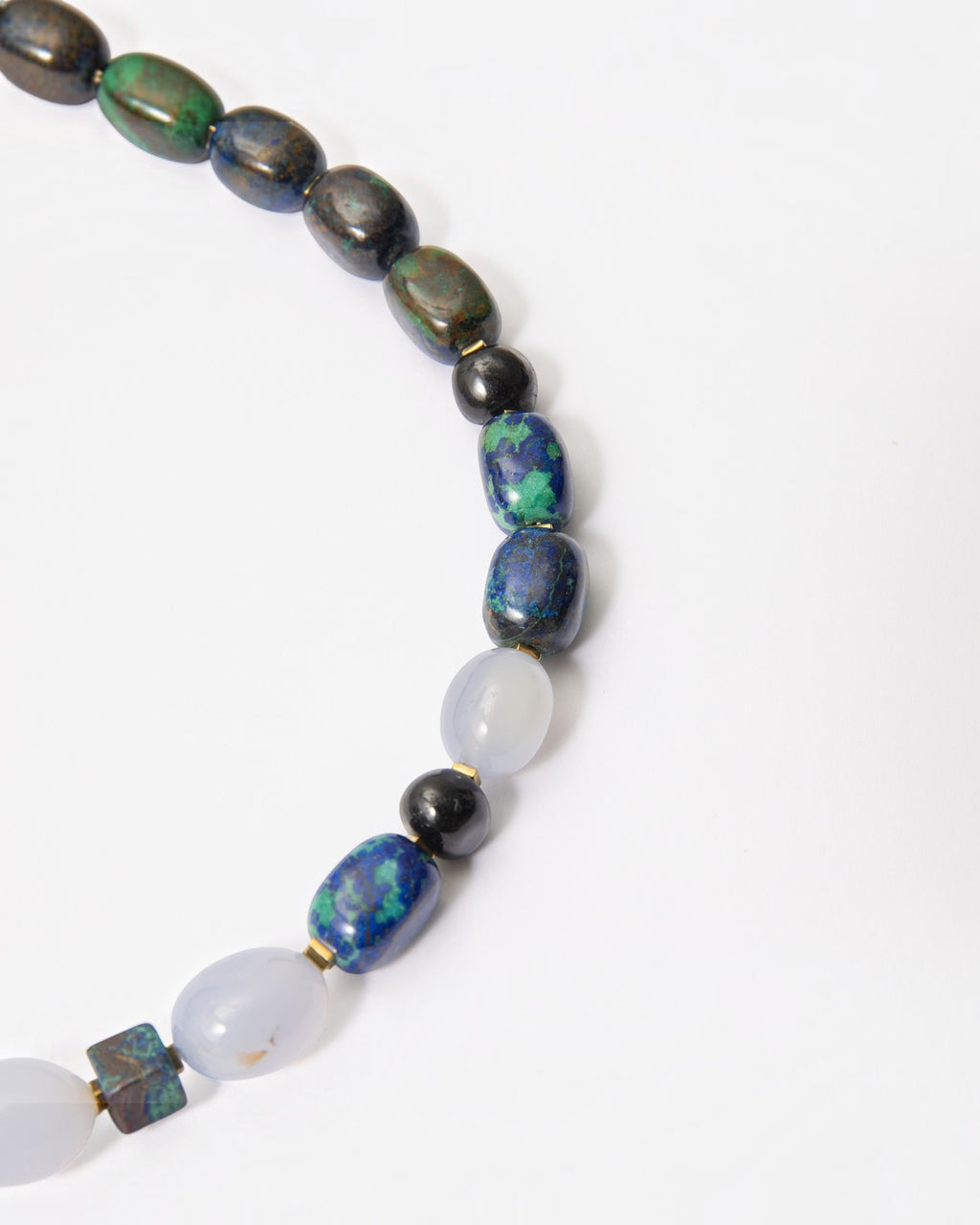Elsita Jewelry Blausee Depth necklace featuring azurite, amazonite, chalcedony, and black tourmaline mineral beads.
