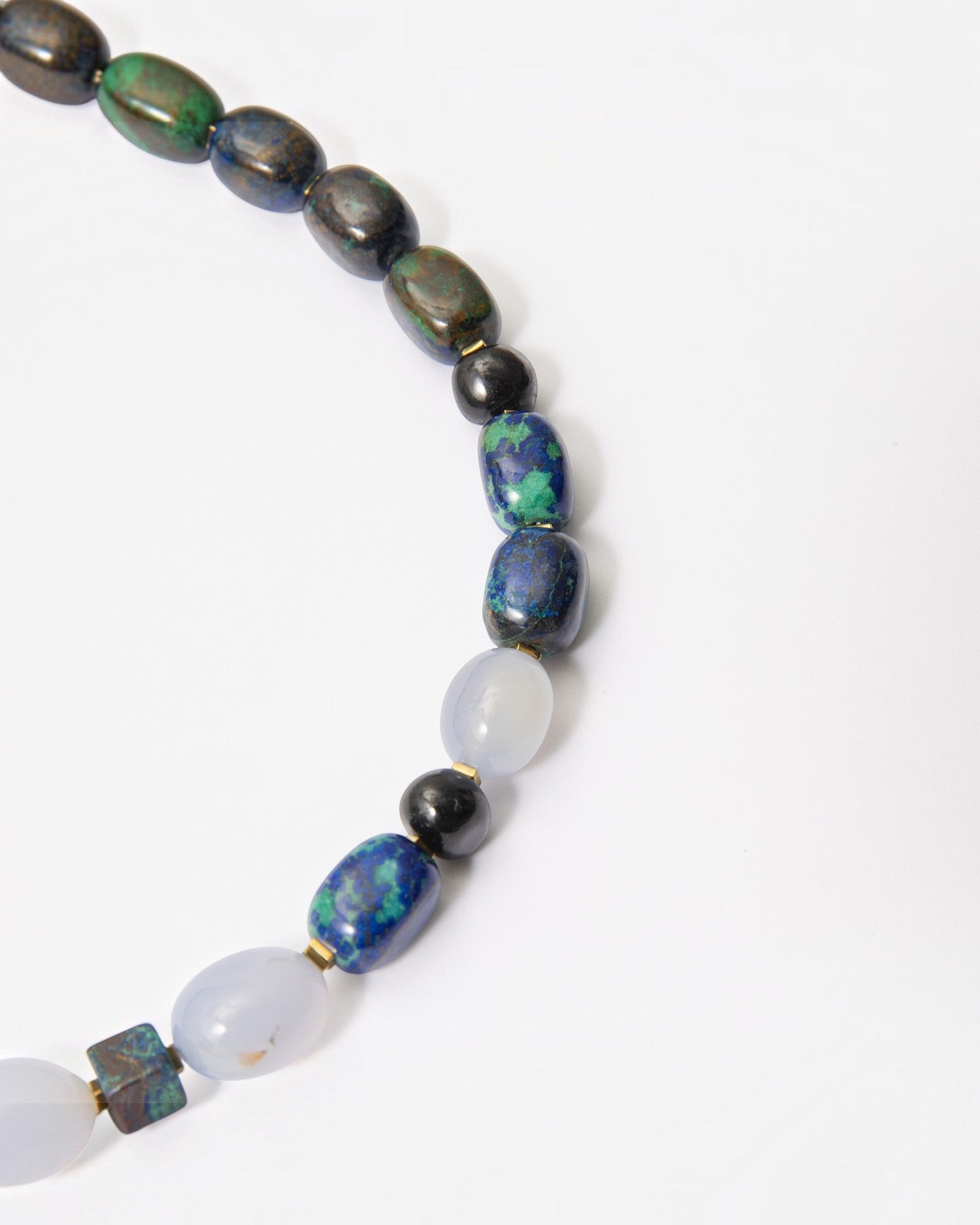 Elsita Jewelry Blausee Depth necklace featuring azurite, amazonite, chalcedony, and black tourmaline mineral beads.
