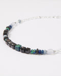 Elsita Jewelry Blausee Deep necklace featuring faceted black agate, chrysocolla, and blue chalcedony mineral beads.