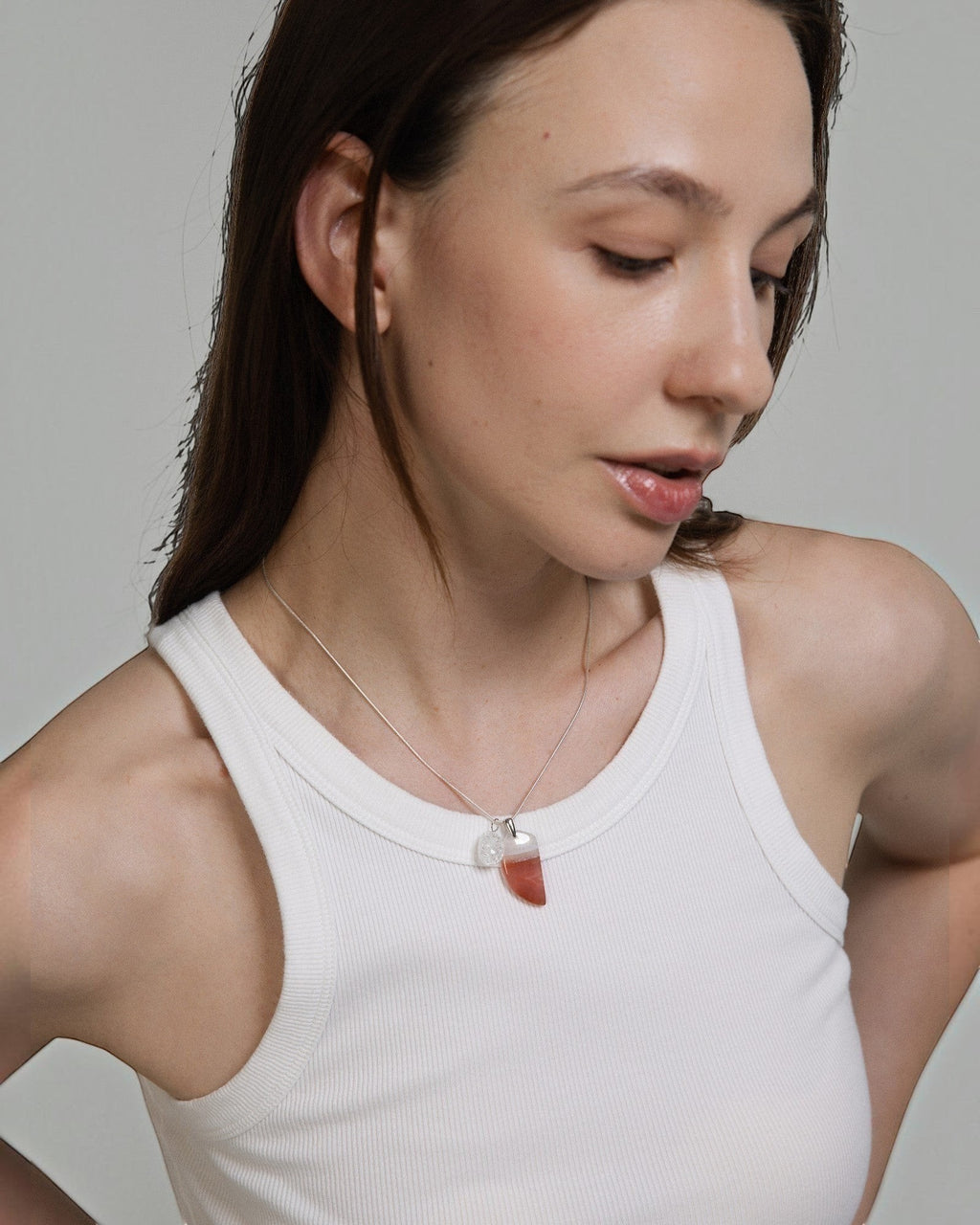Elsita Jewelry Soda IV necklace featuring a crescent red agate and clear quartz pendant on a sterling silver snake chain