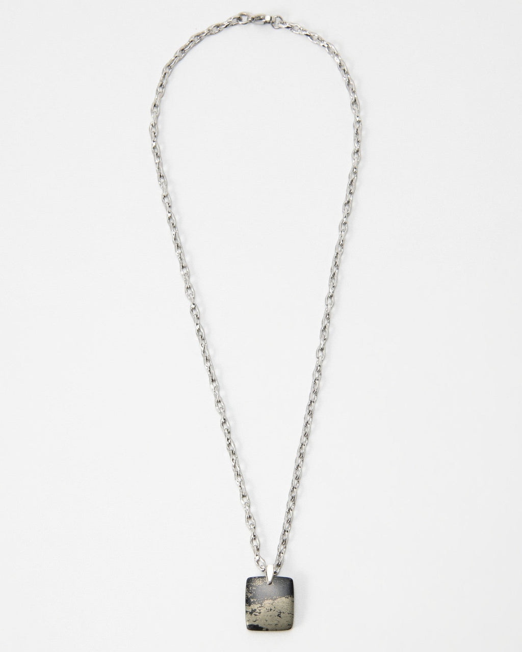 Elsita Jewelry Dune Night necklace featuring a square grey and black stone pendant on a silver chain