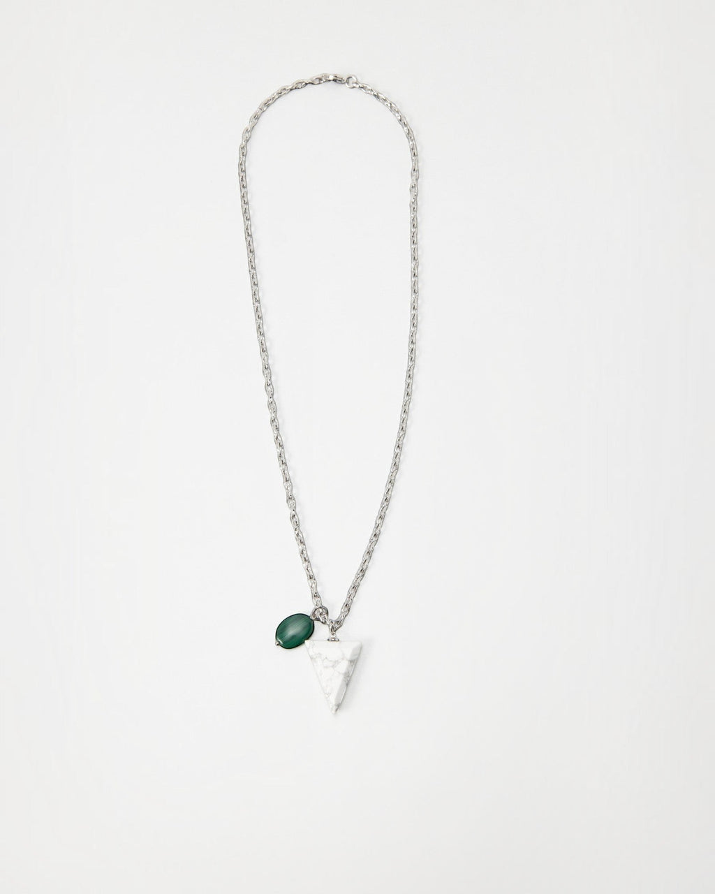 Elsita Jewelry Forest necklace featuring a white marble triangle pendant and a green stone charm on a silver chain.