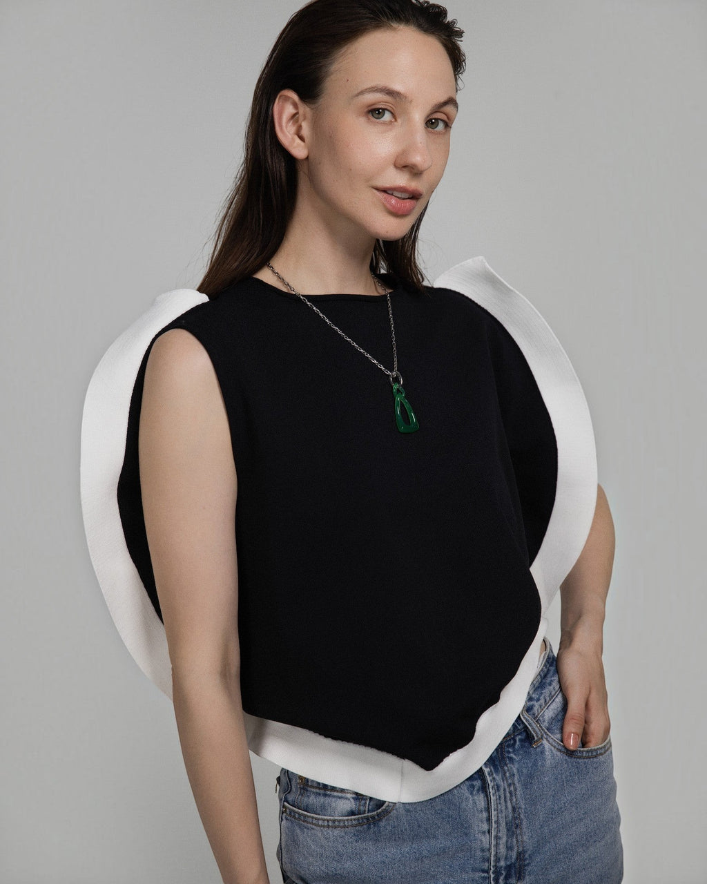 Model wearing an Elsita Jewelry green agate interlocked chain pendant necklace on a silver-tone stainless steel chain.