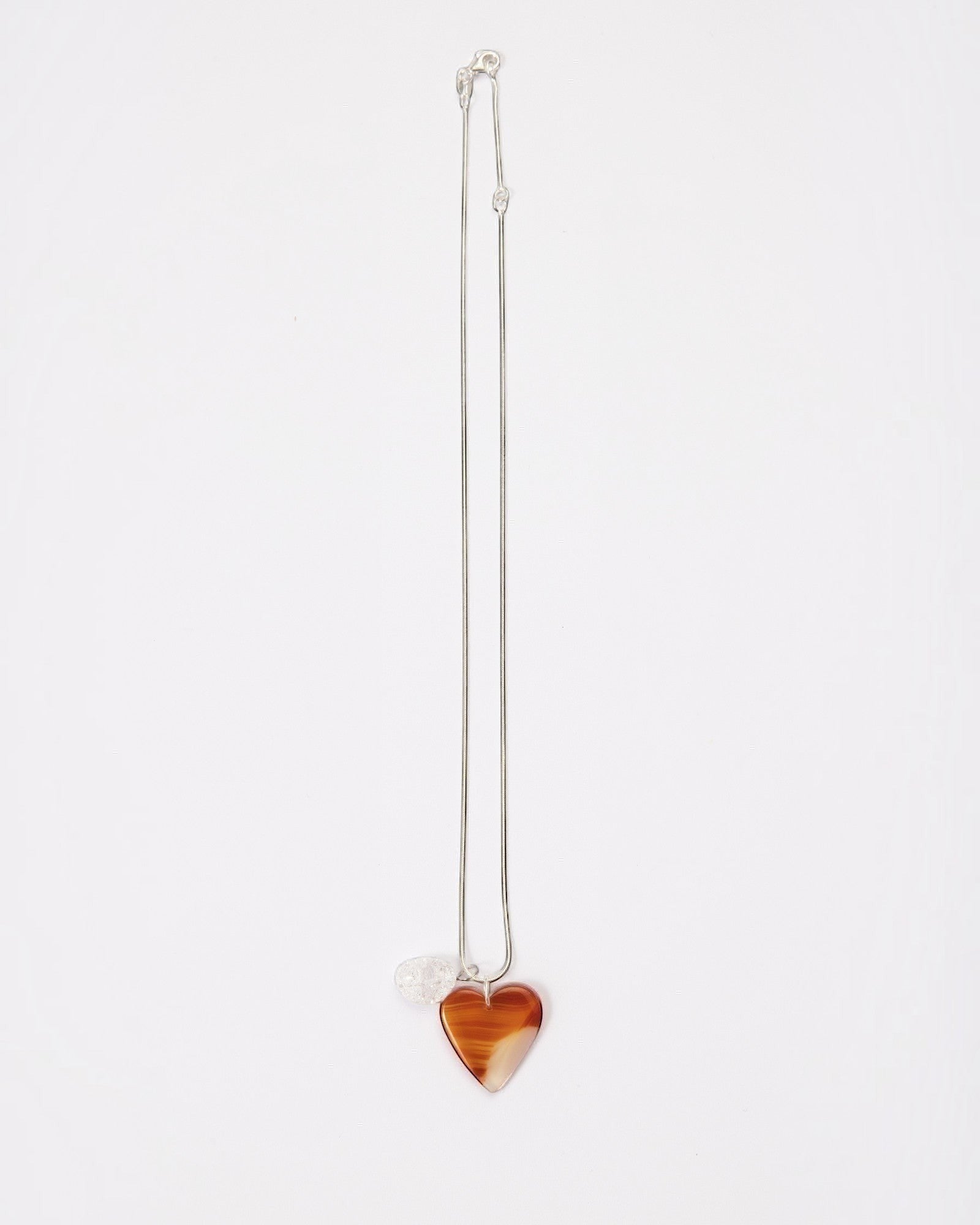 Elsita Jewelry Soda I heart-shaped red agate and clear quartz pendant necklace on a sterling silver snake chain