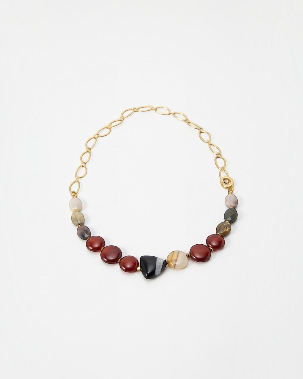 Elsita Jewelry Herbst necklace featuring earthy multi-colored gemstone beads and a gold chain link design.