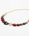 Elsita Jewelry Herbst necklace featuring multicolored polished gemstone beads and a gold chain link clasp