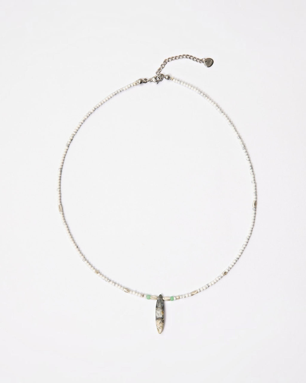 Elsita Jewelry Snowline Grey necklace featuring white howlite beads, grey agate pendant, and sterling silver accents.