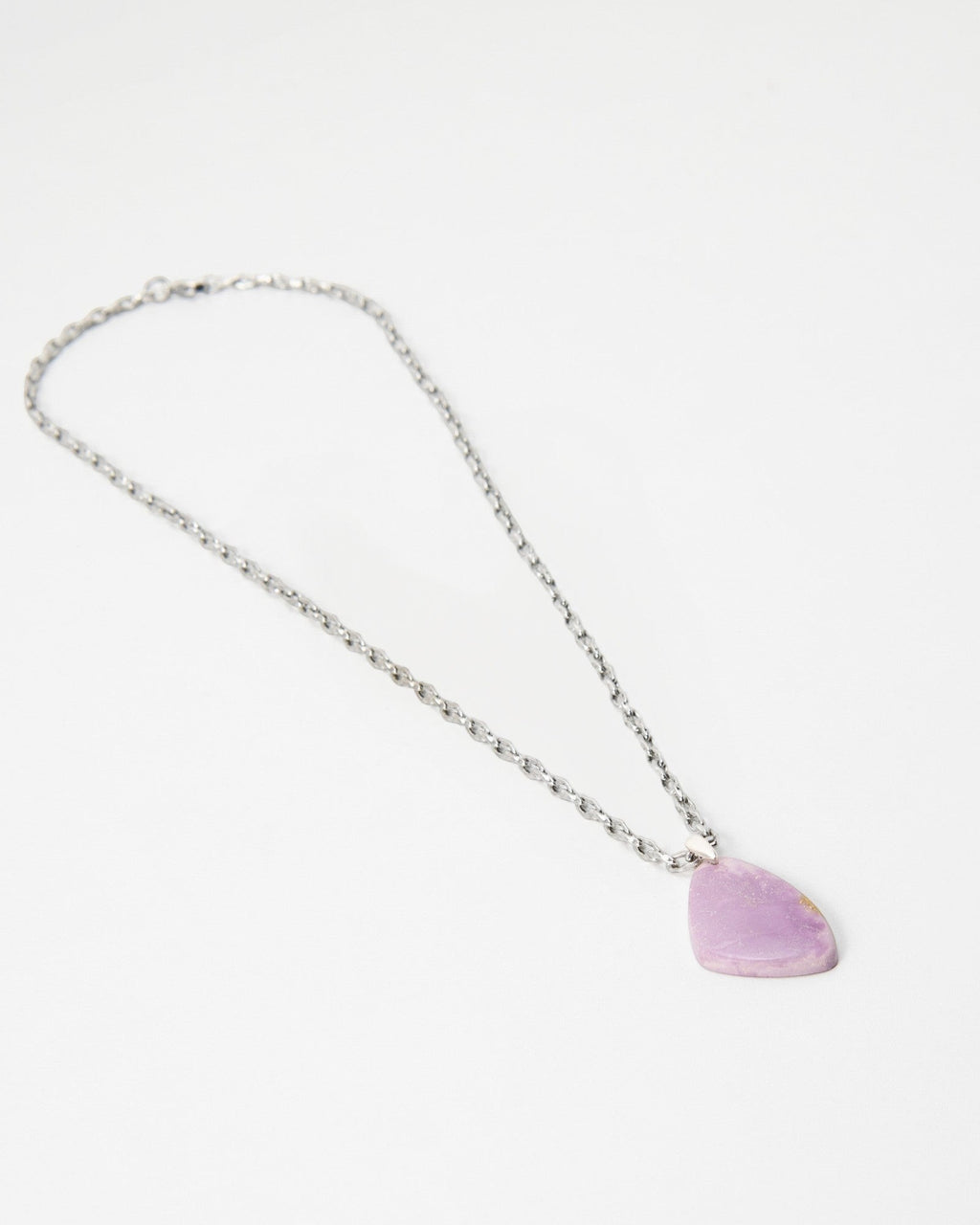 Elsita Jewelry Lilac necklace featuring a smooth, irregular light purple stone pendant on a silver chain.