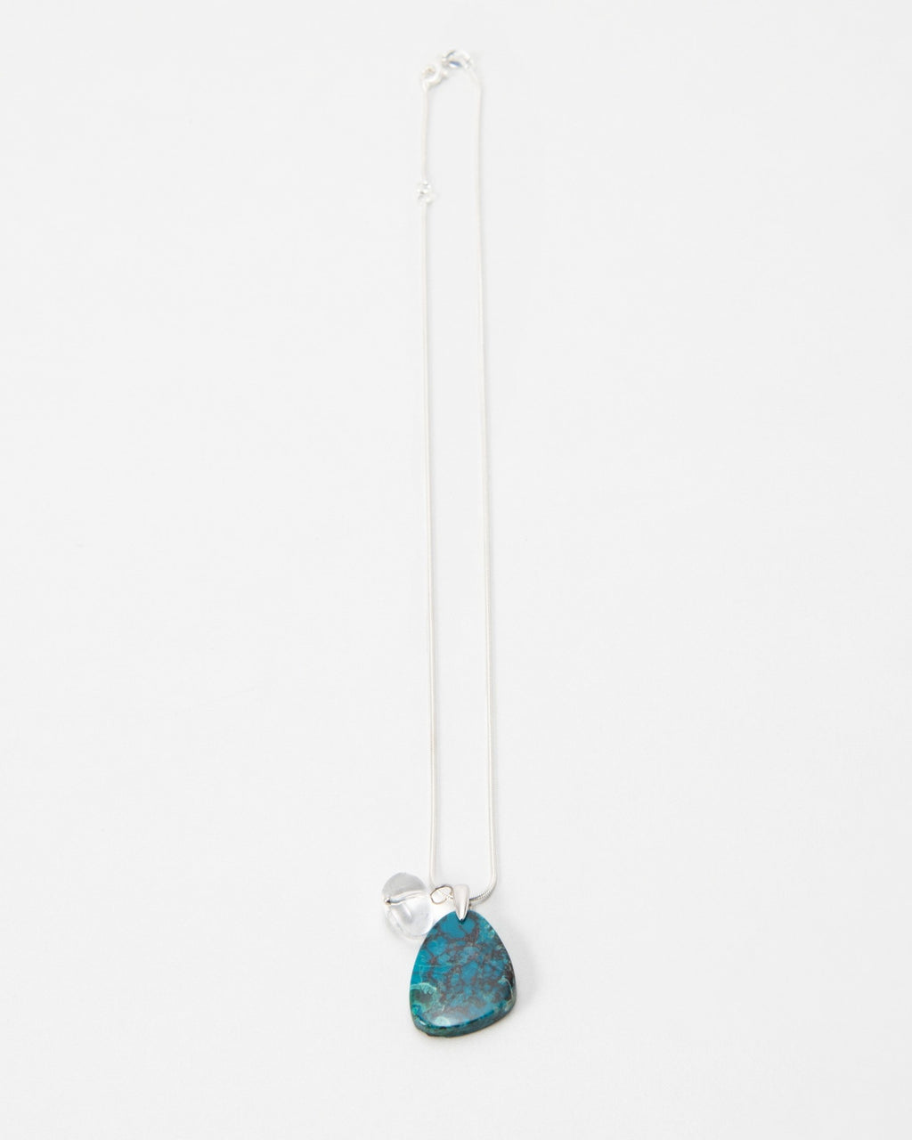 Elsita Jewelry Marine necklace featuring a teardrop-shaped blue and green stone pendant on a delicate silver chain