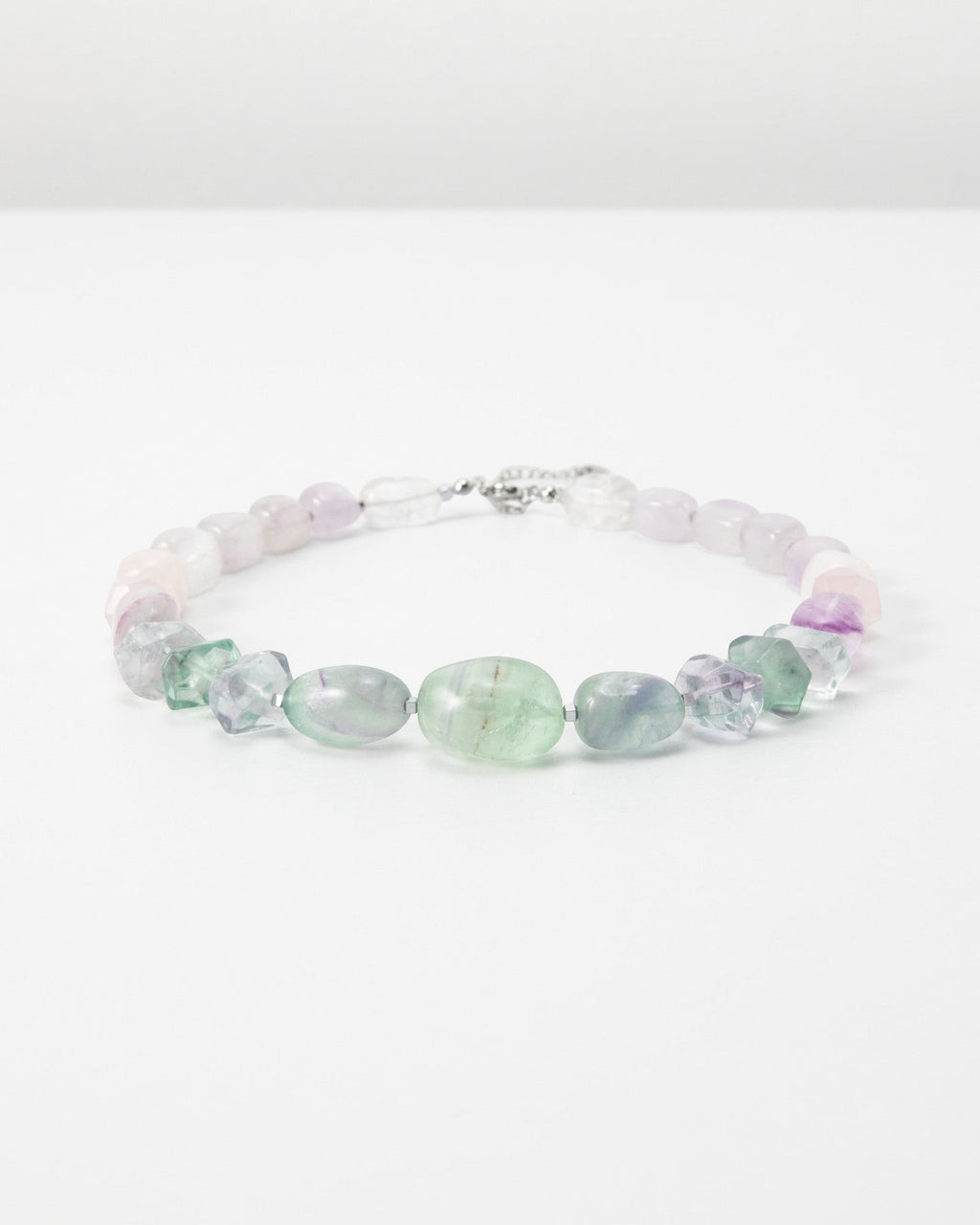 Elsita Jewelry Pastel bracelet featuring polished multi-coloured fluorite gemstone beads on a white background.
