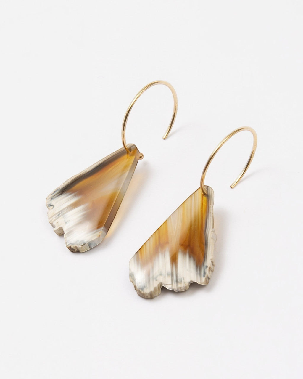Elsita Jewelry Wild 18 raw Indonesian agate slice earrings on 14K gold-filled hoops with earthy beige and brown tones.