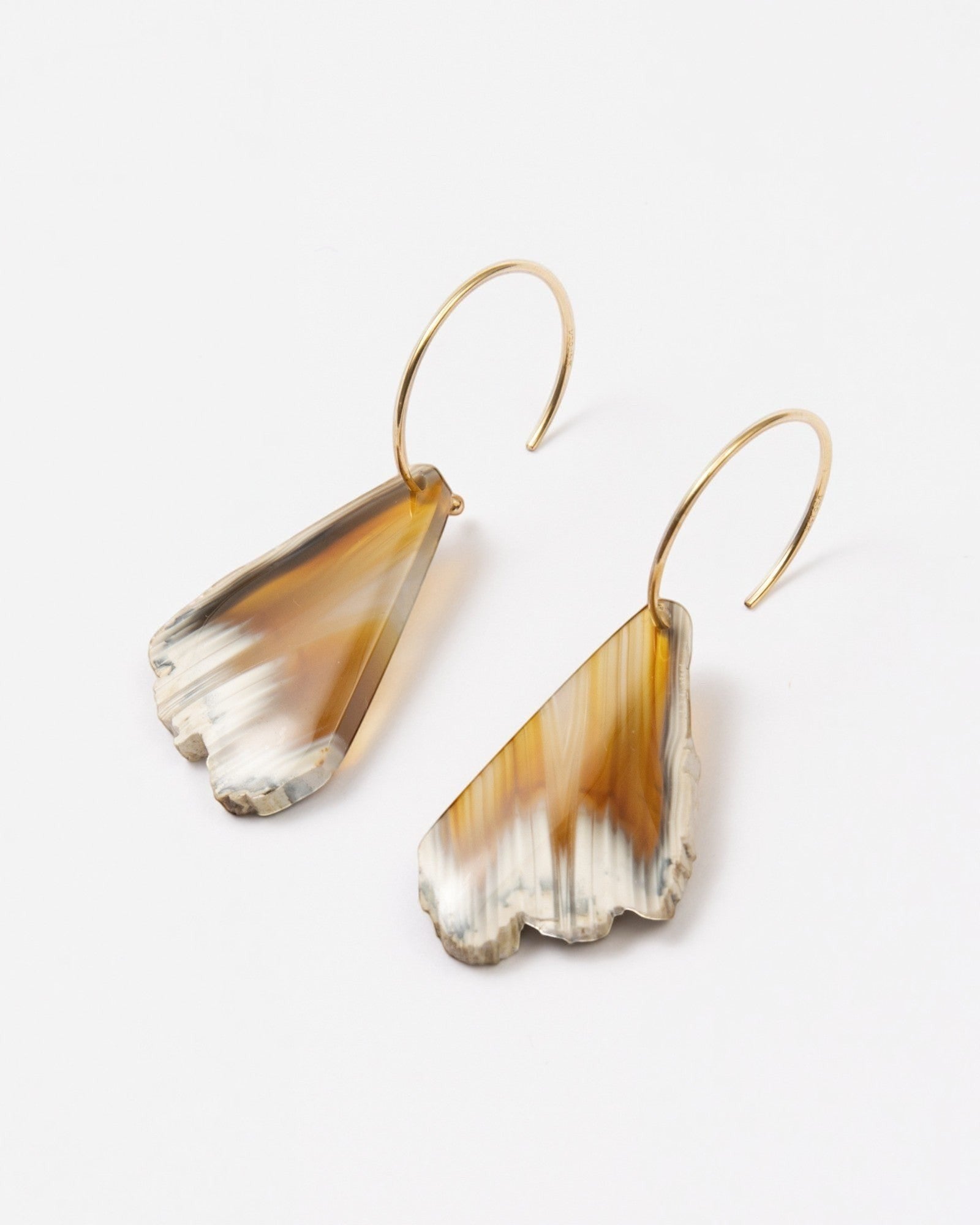 Elsita Jewelry Wild 18 raw Indonesian agate slice earrings on 14K gold-filled hoops with earthy beige and brown tones.