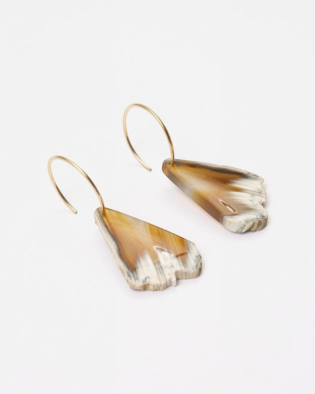 Elsita Jewelry Wild 18 raw Indonesian agate slice earrings on 14K gold-filled hoops with earthy brown and beige tones.