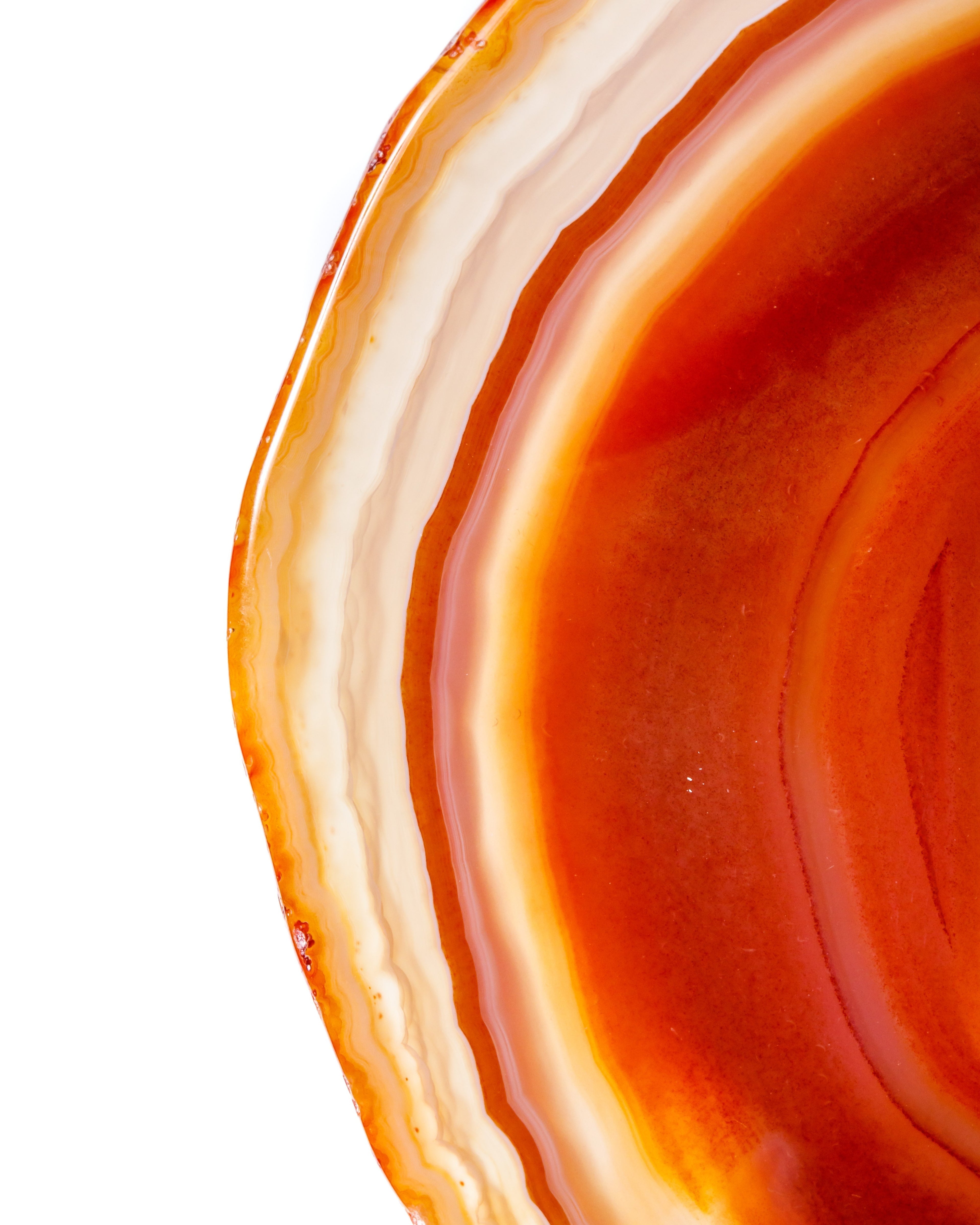 Elsita Jewelry Edge earrings featuring a close-up of red agate stone with banded orange and deep red gradient