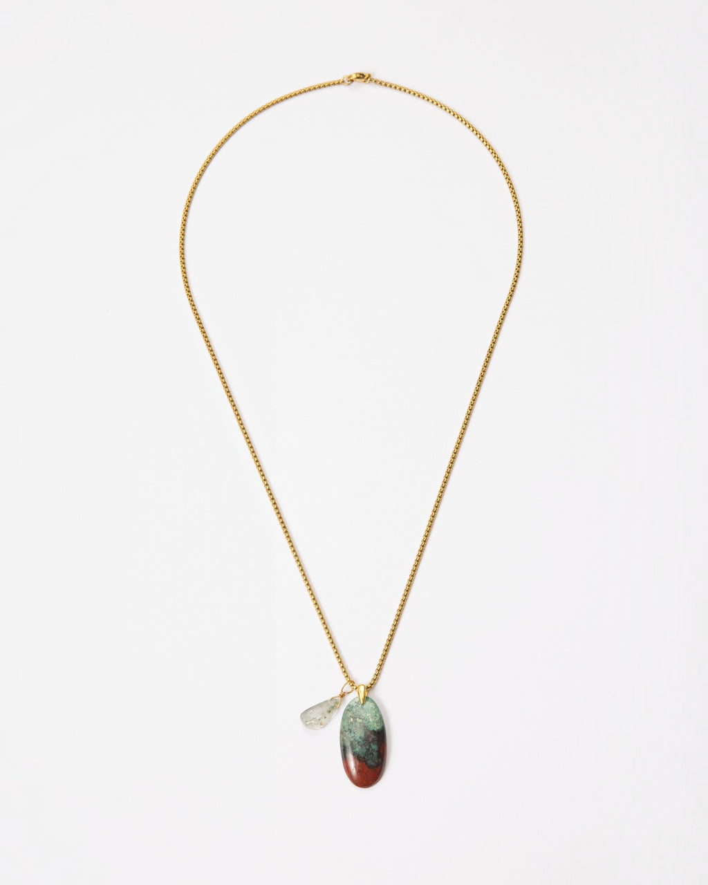 Elsita Jewelry Horizon III necklace featuring a Sonora sunset stone and green quartz pendant on a gold-tone chain.