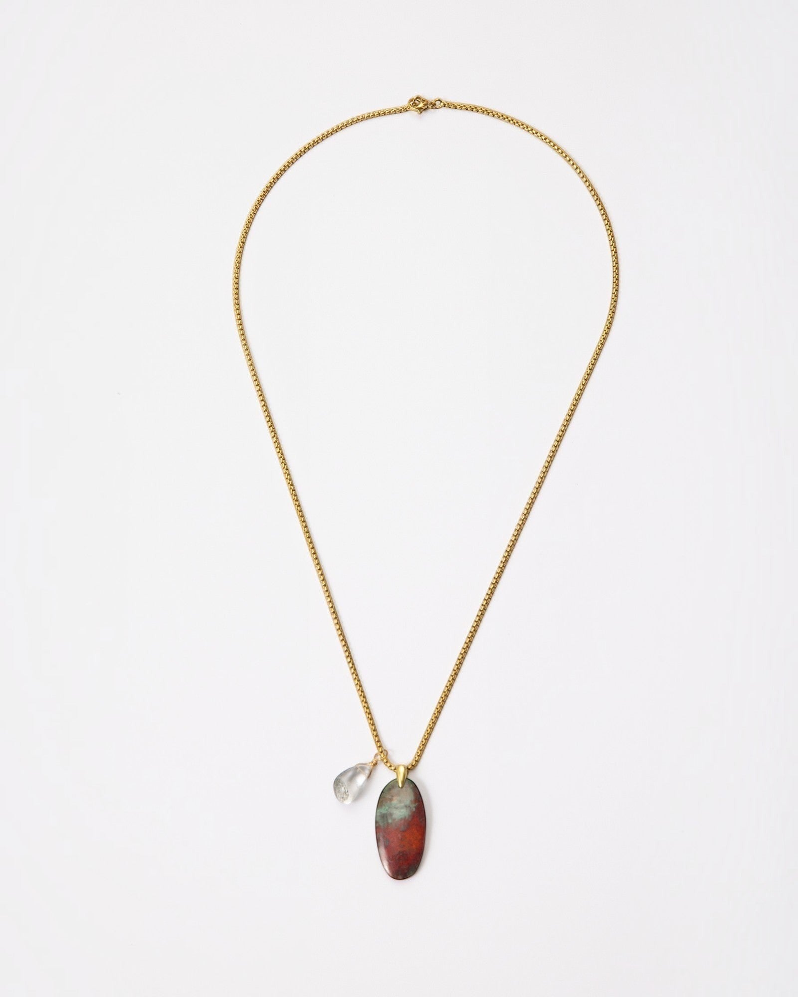 Elsita Jewelry Horizon IV necklace featuring an oval Sonora sunset stone and green quartz on a gold-tone chain.