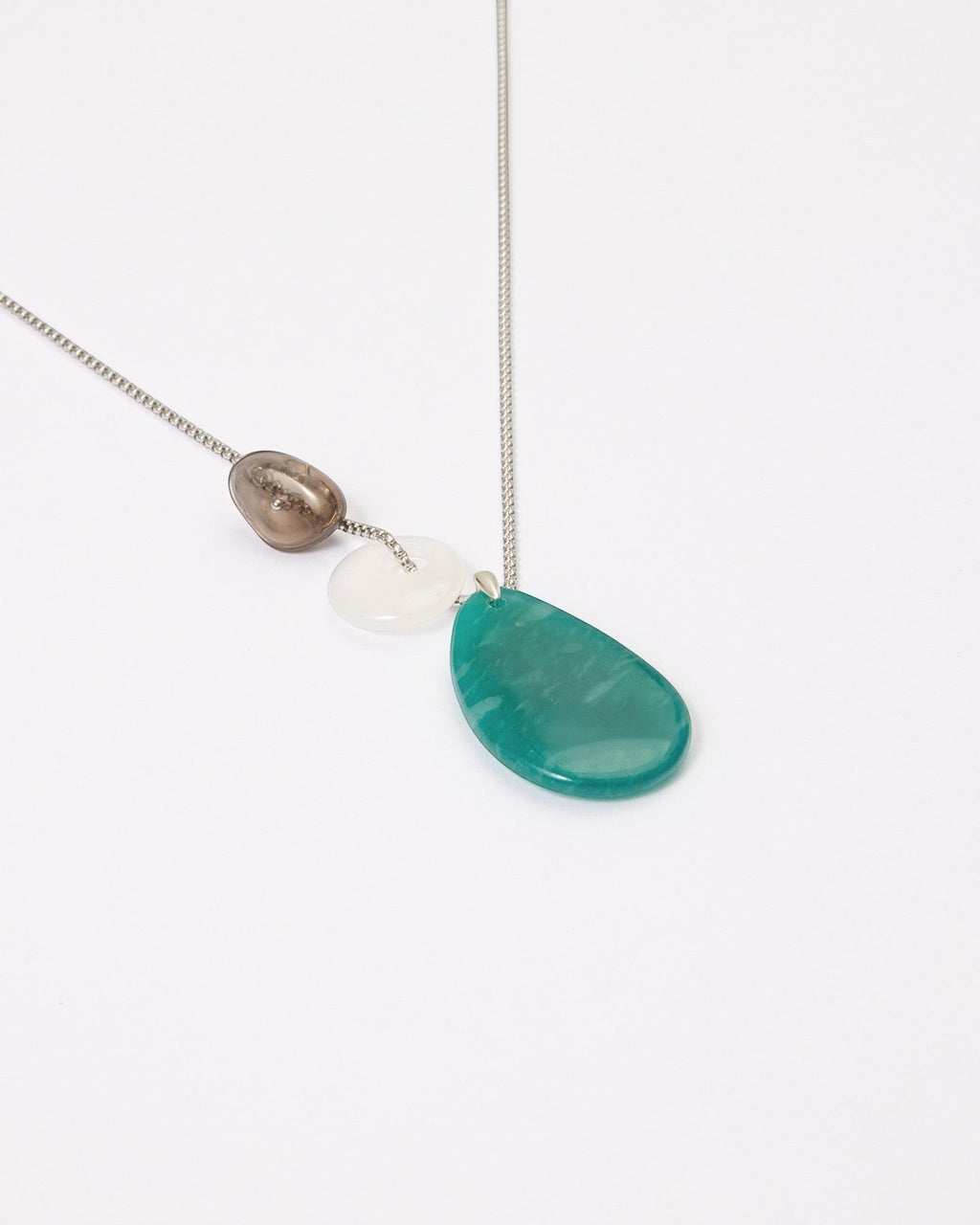 Elsita Jewelry Stein am Rhein necklace featuring a large green Amazonite, white Agate, and Smoky Quartz on a silver chain