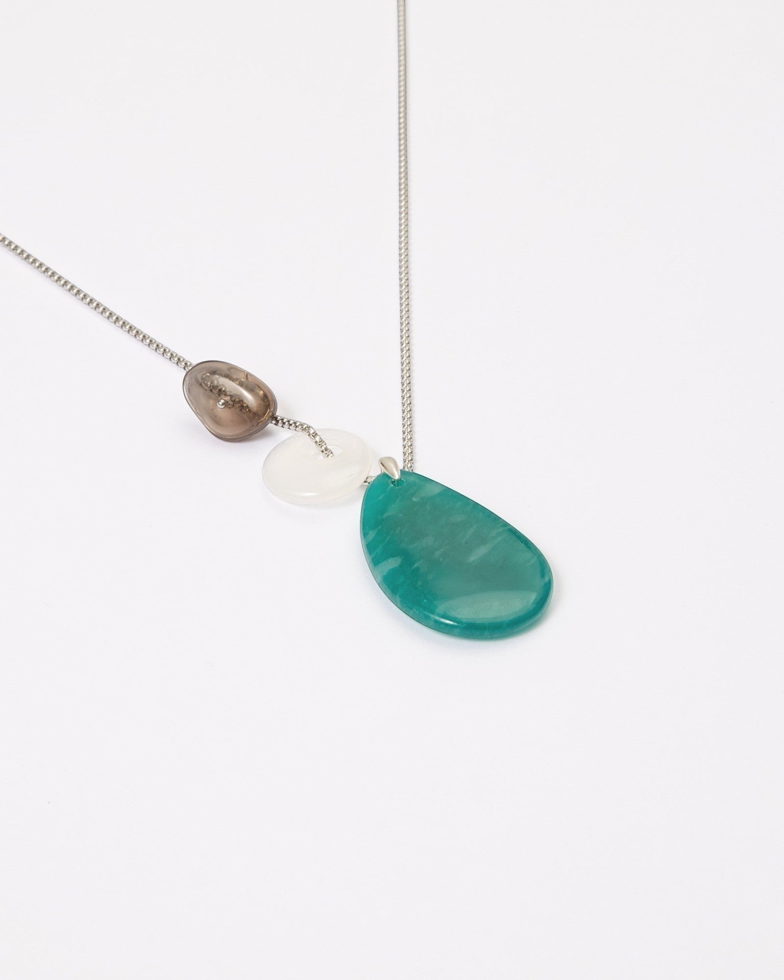 Elsita Jewelry Stein am Rhein necklace featuring a large green Amazonite, white Agate, and Smoky Quartz on a silver chain