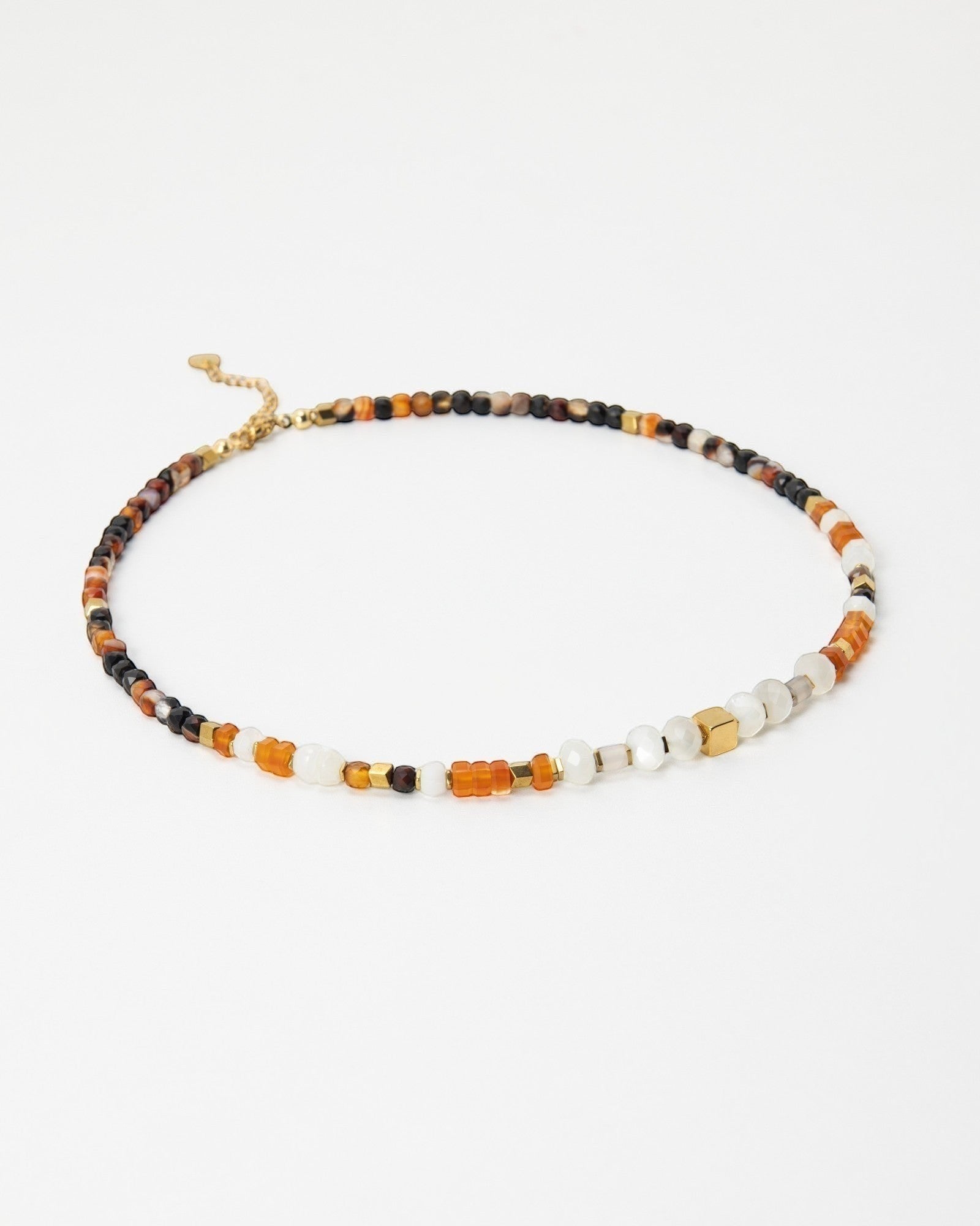 Elsita Jewelry Untamed beaded choker necklace with multi-colored gemstones, pearls, and gold-tone accents.