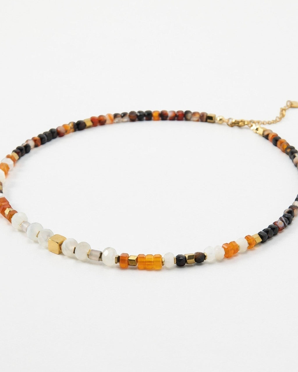 Elsita Jewelry Untamed beaded necklace featuring multi-colored gemstone beads and small gold-tone metal accents