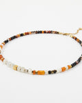 Elsita Jewelry Untamed beaded necklace featuring multi-colored gemstone beads and small gold-tone metal accents