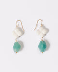Elsita Jewelry Sky earrings featuring faceted lagoon-blue Amazonite and white clover-shaped Agate on 14K gold hooks.